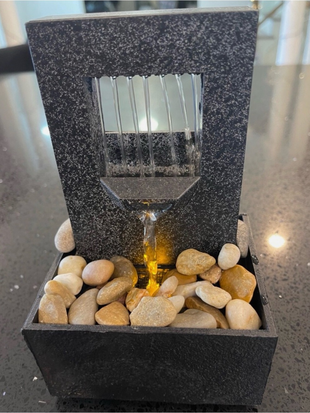 Black Tabletop Fountain with Natural River Stones